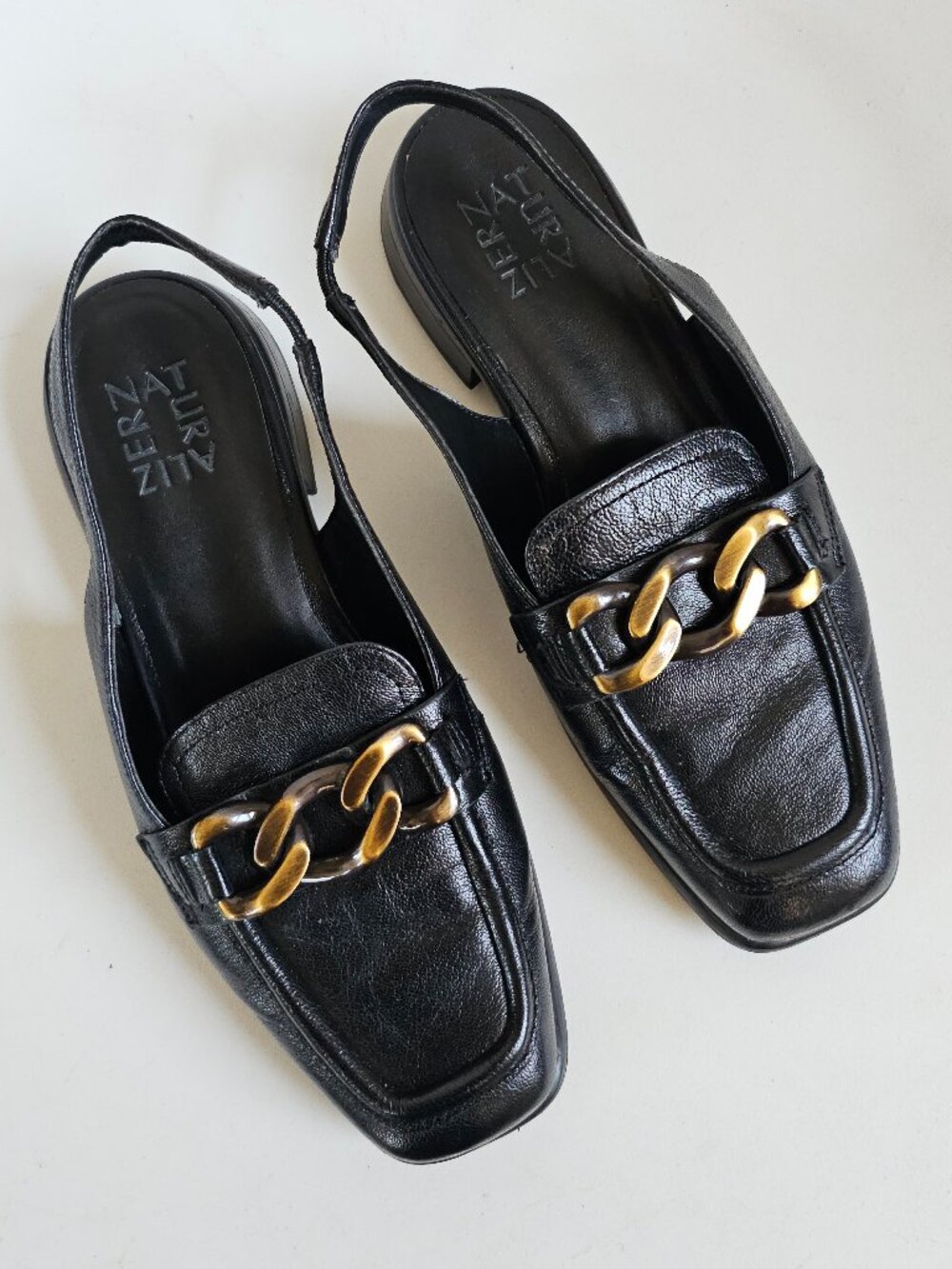 NATURALIZER Black Leather Slingback Loafers with Gold Chain Accent